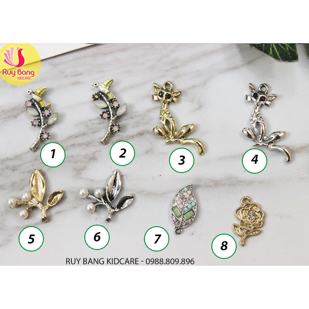 Cành lá kim loại, center đá đính hoa vải handmade