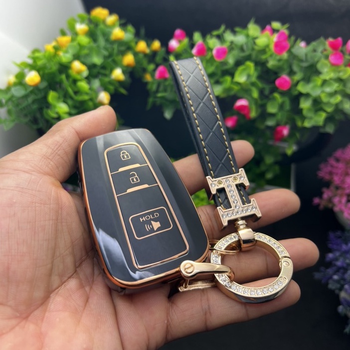Ốp chìa khóa-bọc chìa khóa TPU Đen-vàng  xe ô tô Toyota Cross Smartkey
