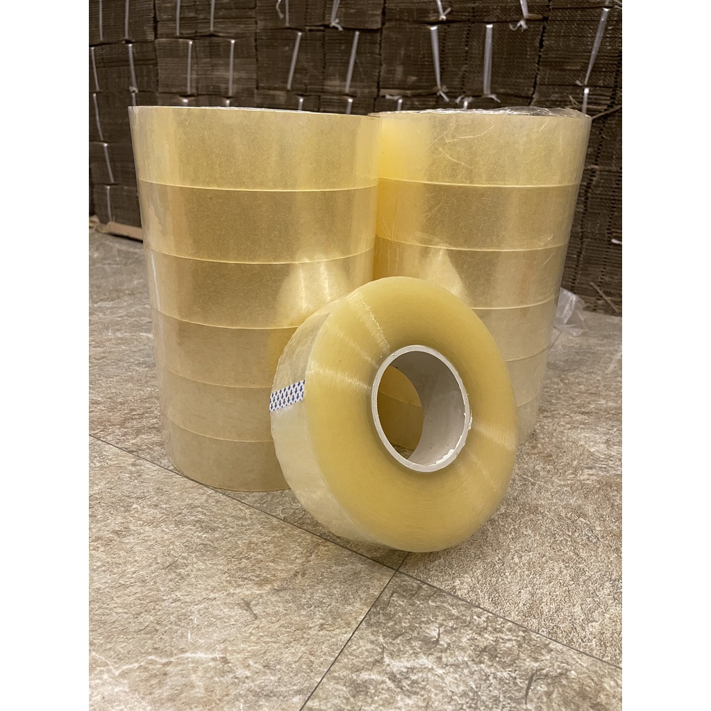 Băng dính màu trắng trong 1kg dùng gói hàng COD lõi siêu mỏng - 1 cuộn