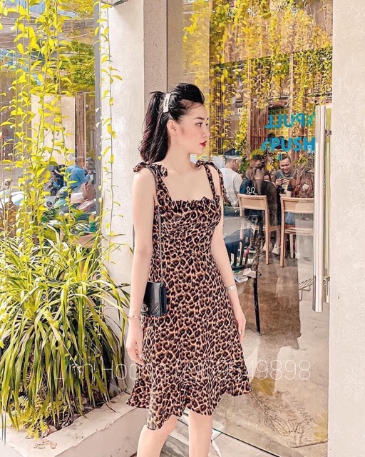 Đầm thun da beo 2 dây cột đuôi xoè