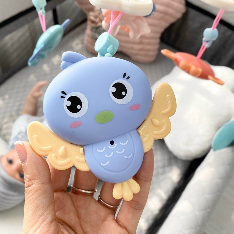 Đồ chơi treo nôi cũi tự xoay 360 độ phát nhạc ru ngủ cho bé