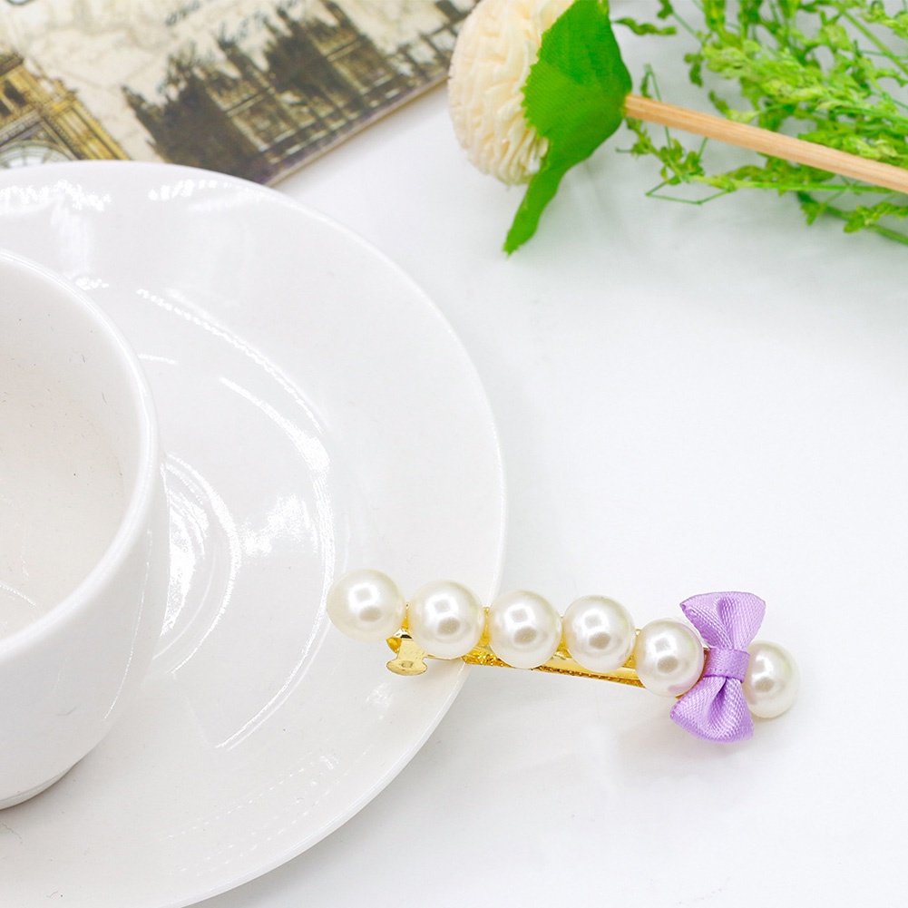 Kẹp tóc nơ đính ngọc trai xinh xắn cho nữ