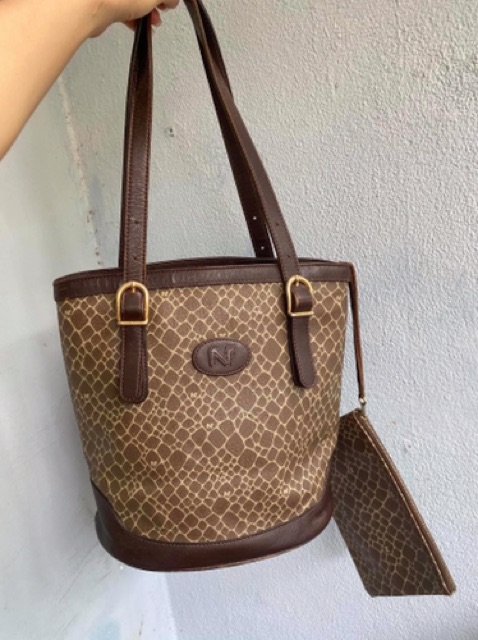 Túi dáng xô chậu nina ricci