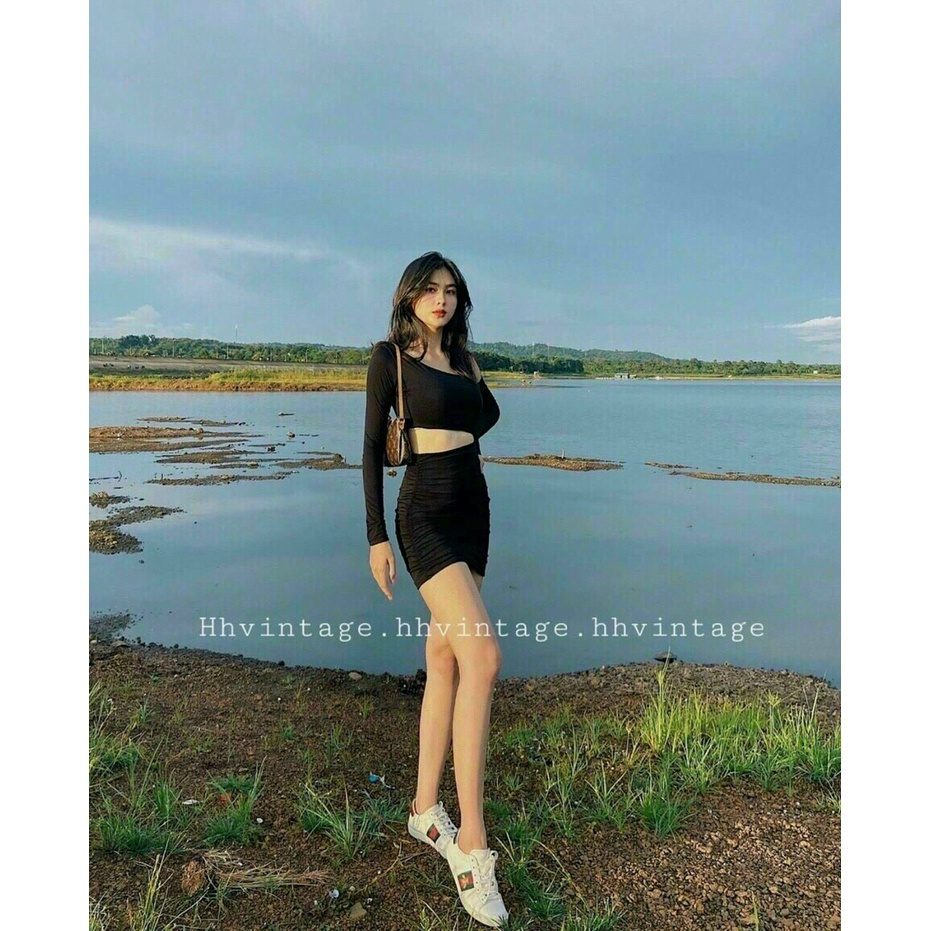 Đầm body tay dài khoét eo sành điệu