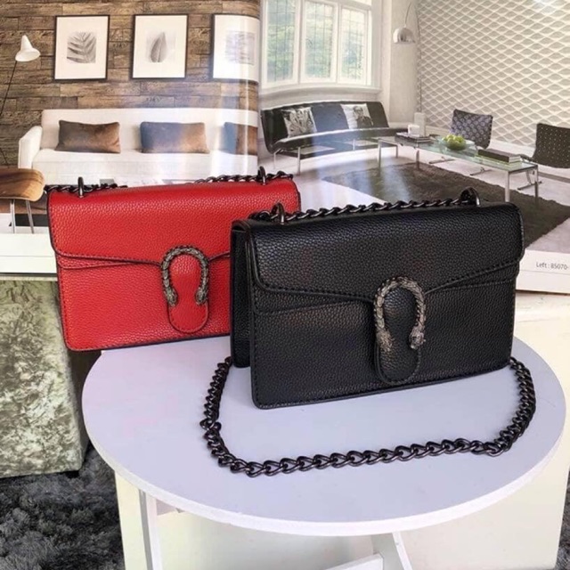 Túi đeo chéo đầu rồng