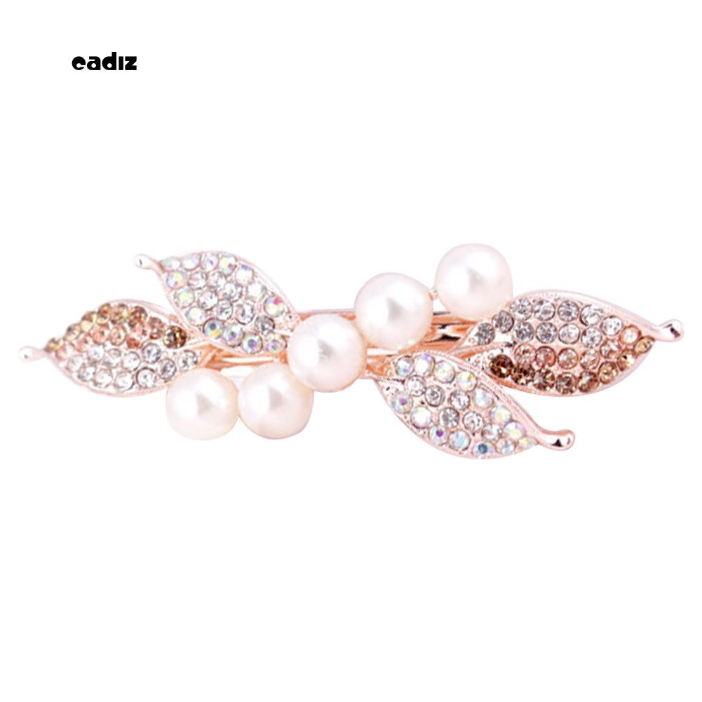 Kẹp tóc nơ đính hạt giả ngọc trai