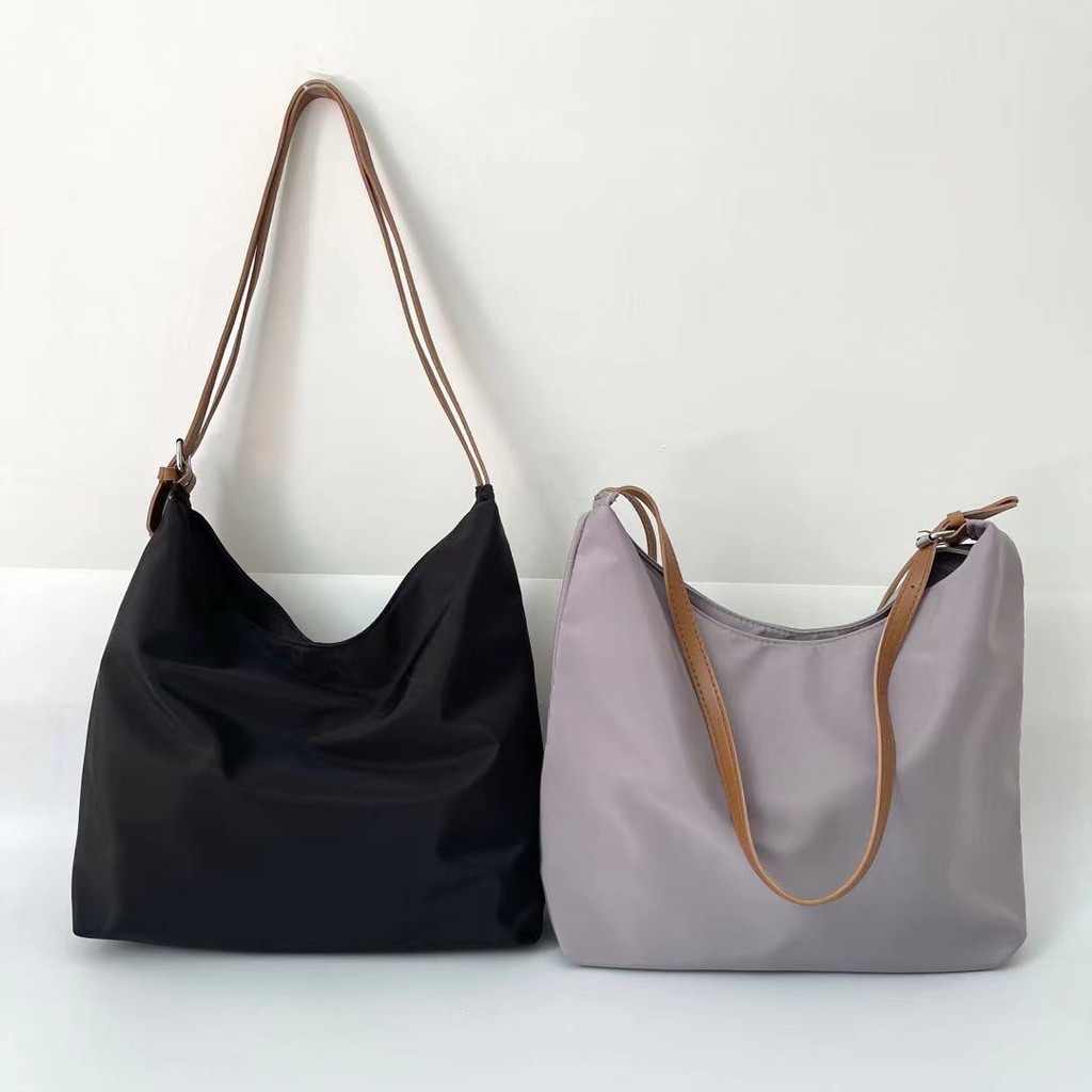 Túi đeo chéo một bên vai làm từ vải oxford thời trang cho nữ