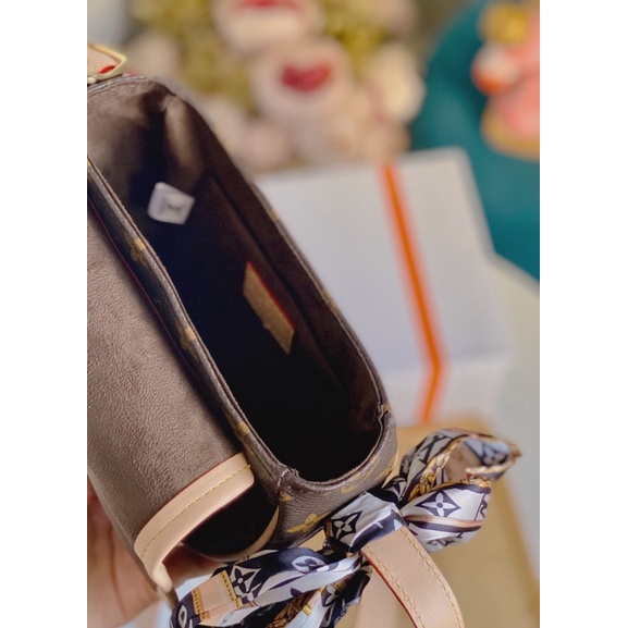 Túi lv tambourine cannas