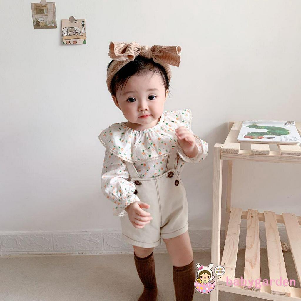 Set quần yếm ngắn và áo dài tay in hoa đáng yêu cho bé gái