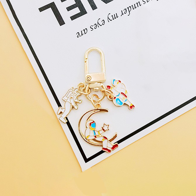 Móc khóa điện thoại hình phi hành gia dễ thương