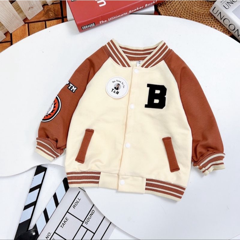 Áo khoác bomber bóng chày bé trai size nhí chất nỉ da cá