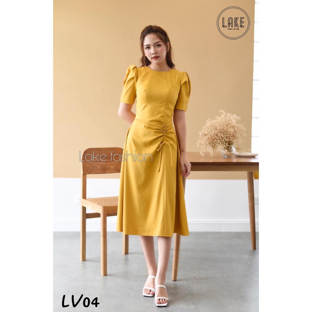 Váy,đầm tay bồng rút eo che bụng lake fashion màu vàng