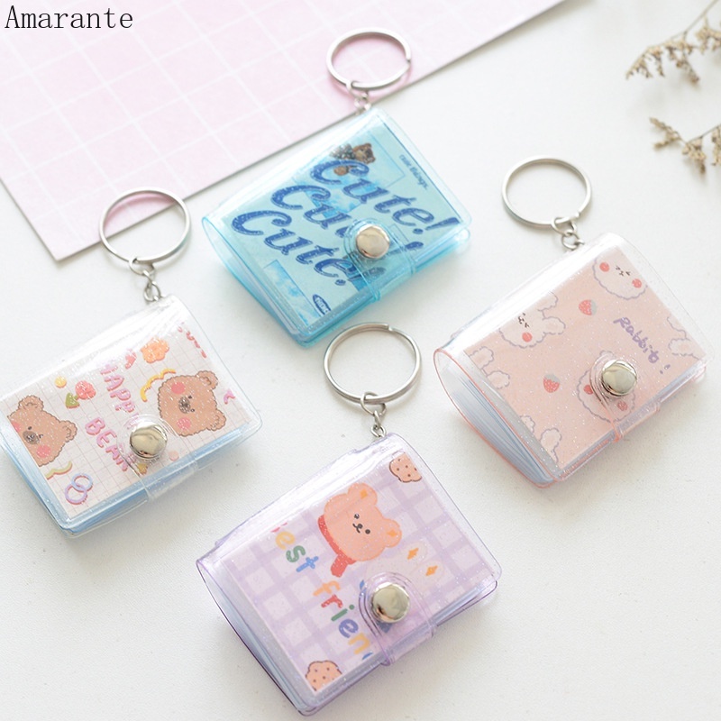 Album Ảnh 1 Inch 16 Ngăn Trong Suốt Lấp Lánh Kèm Móc Khóa