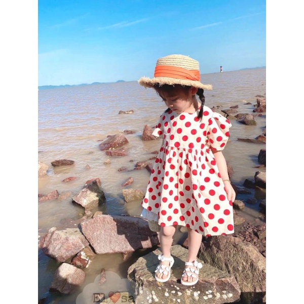 Váy bé gái babydoll tay phồng phối 2 nơ xanh phía sau họa tiết chấm bi xinh xắn, dáng xòe cho bé gái từ 9 đến 19 kg