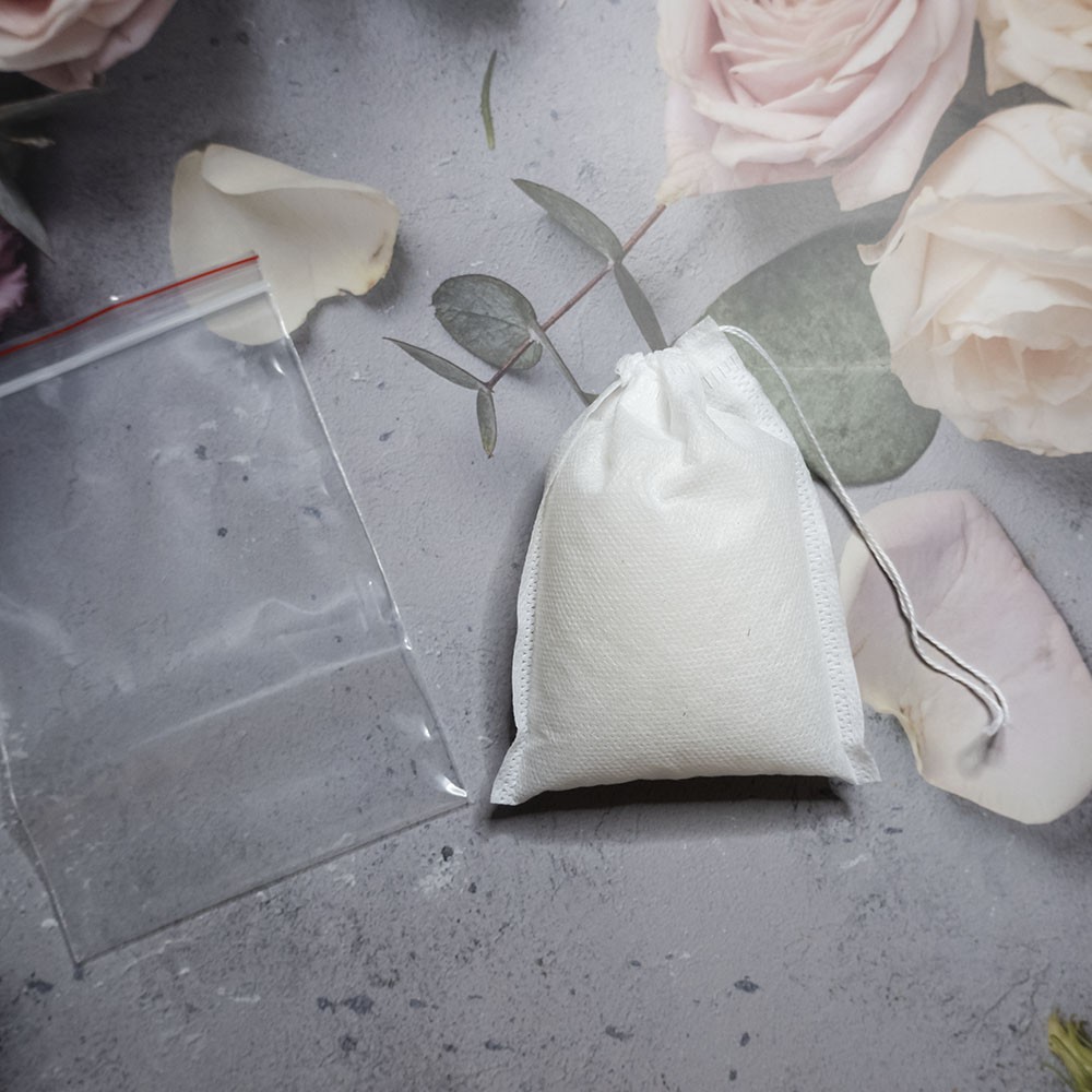 Gói 200g hạt hút ẩm silica gel có hai màu xanh và trắng + tặng kèm túi đựng