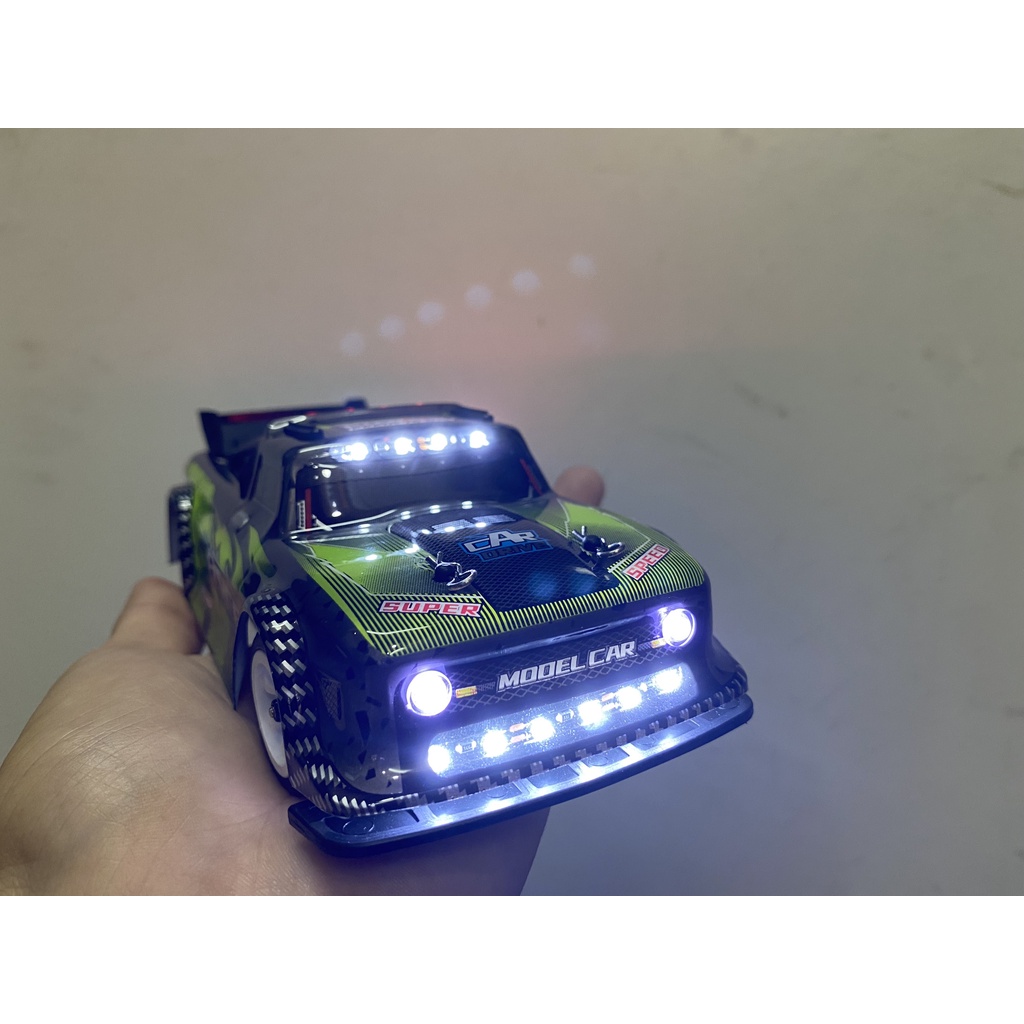 Xe ô tô điều khiển từ xa Wltoys 284131 drift 1/28 model car RC có khung, bánh răng kim loại và  đền led tốc độ 30km/h