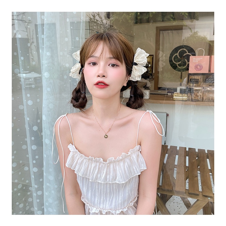 Kẹp tóc thắt nơ hai bên xu hướng thịnh hành Hàn Quốc