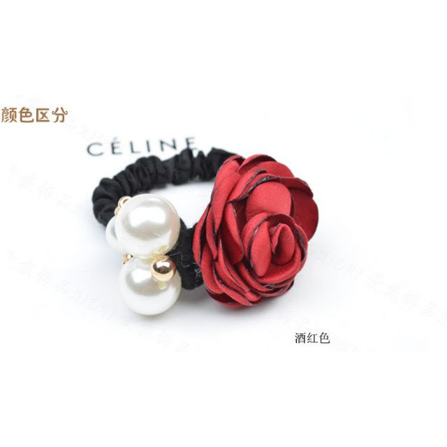 Cột tóc hoa hồng