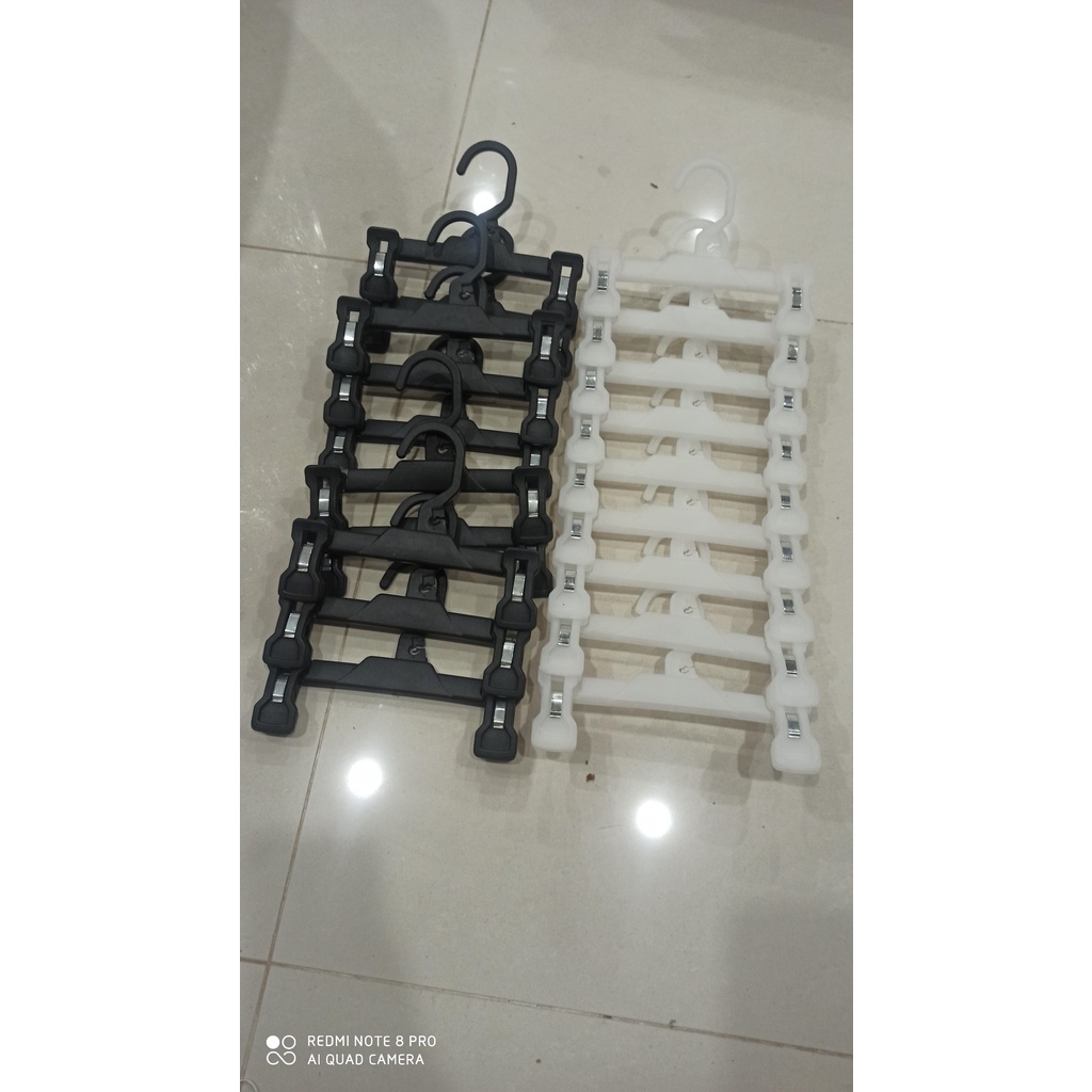 Móc treo quần áo trẻ em bằng nhựa giá rẻ - mắc kẹp quần manetti trẻ em màu cam, trắng, đen hàng loại 1