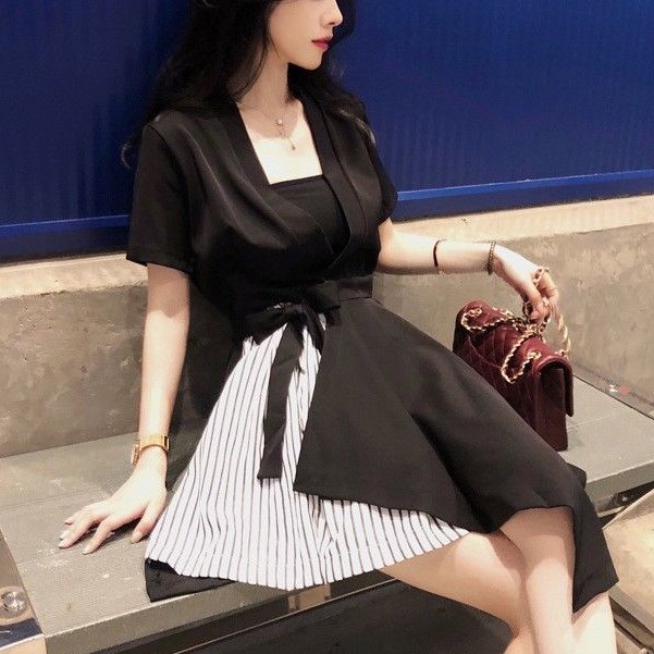 Women's office dress with short sleeves and black skirt