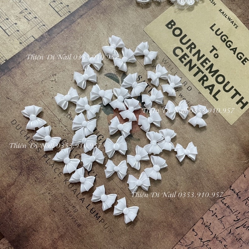 Nơ trắng đính móng tay - nơ bột THIÊN DI NAIL