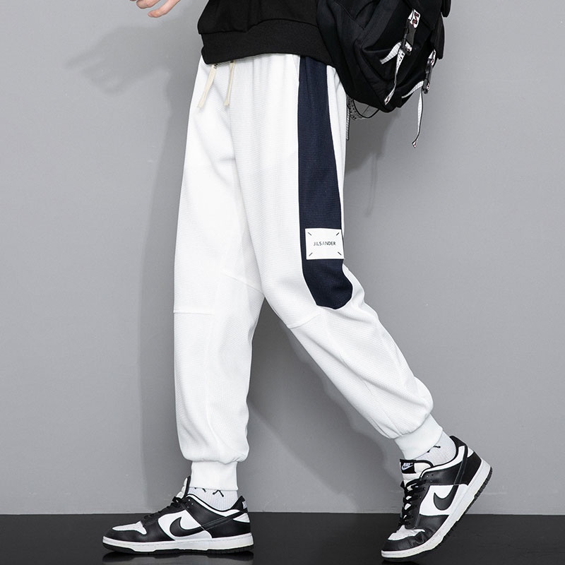 Quần Dài Thể Thao Dáng Rộng Có Túi Sau Lưng Thời Trang Mùa Thu Cho Nam