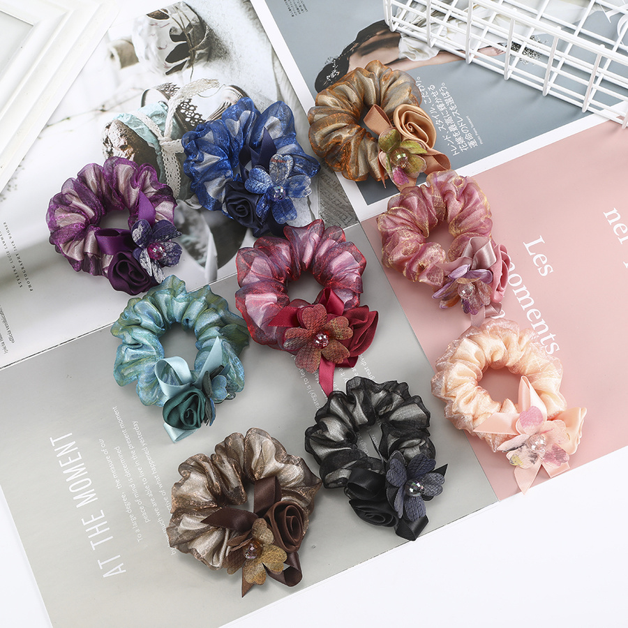 Dây buộc tóc hình hoa xinh xắn dành cho nữ