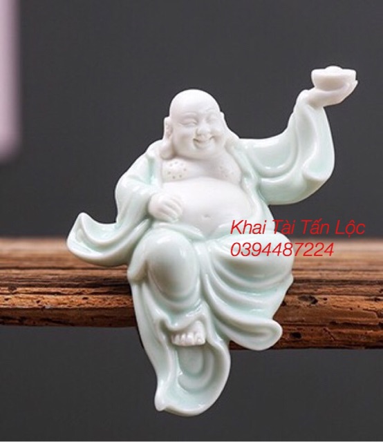 Tượng phật Di Lặc cầm thỏi vàng bằng bạch gốm