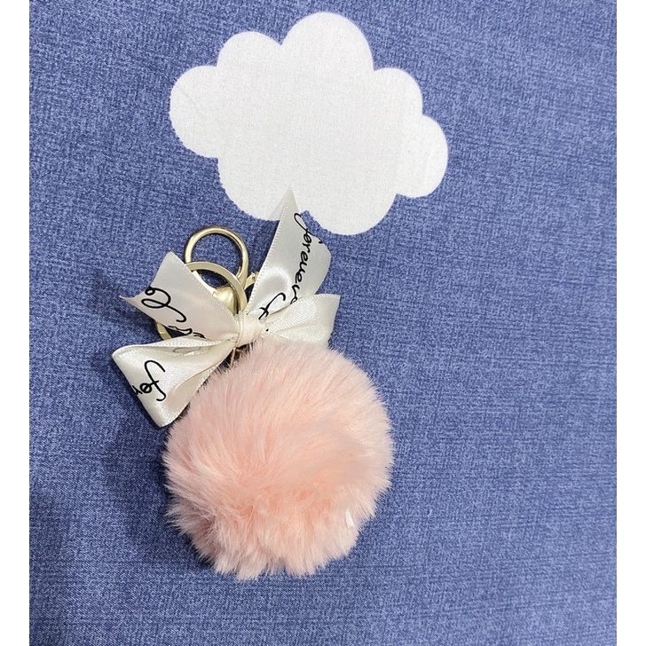 Charm bông nơ treo túi