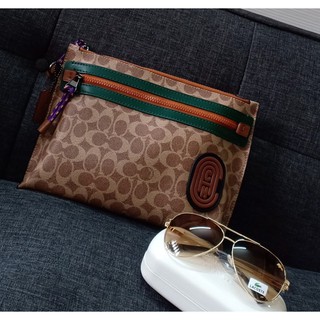 Túi Coach Clutch