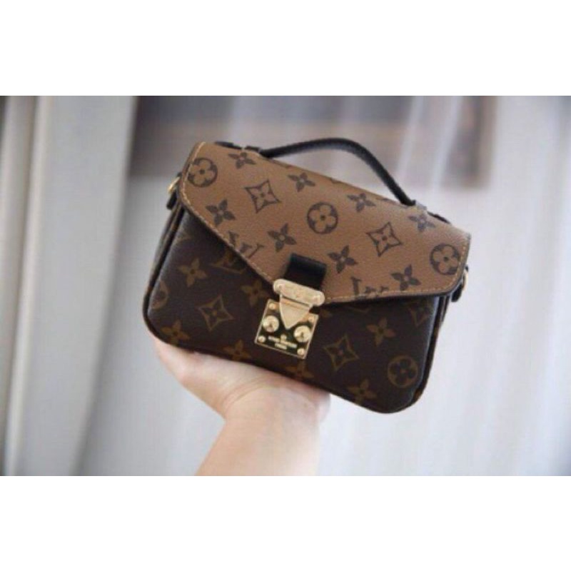 Túi xách tay đeo chéo metis