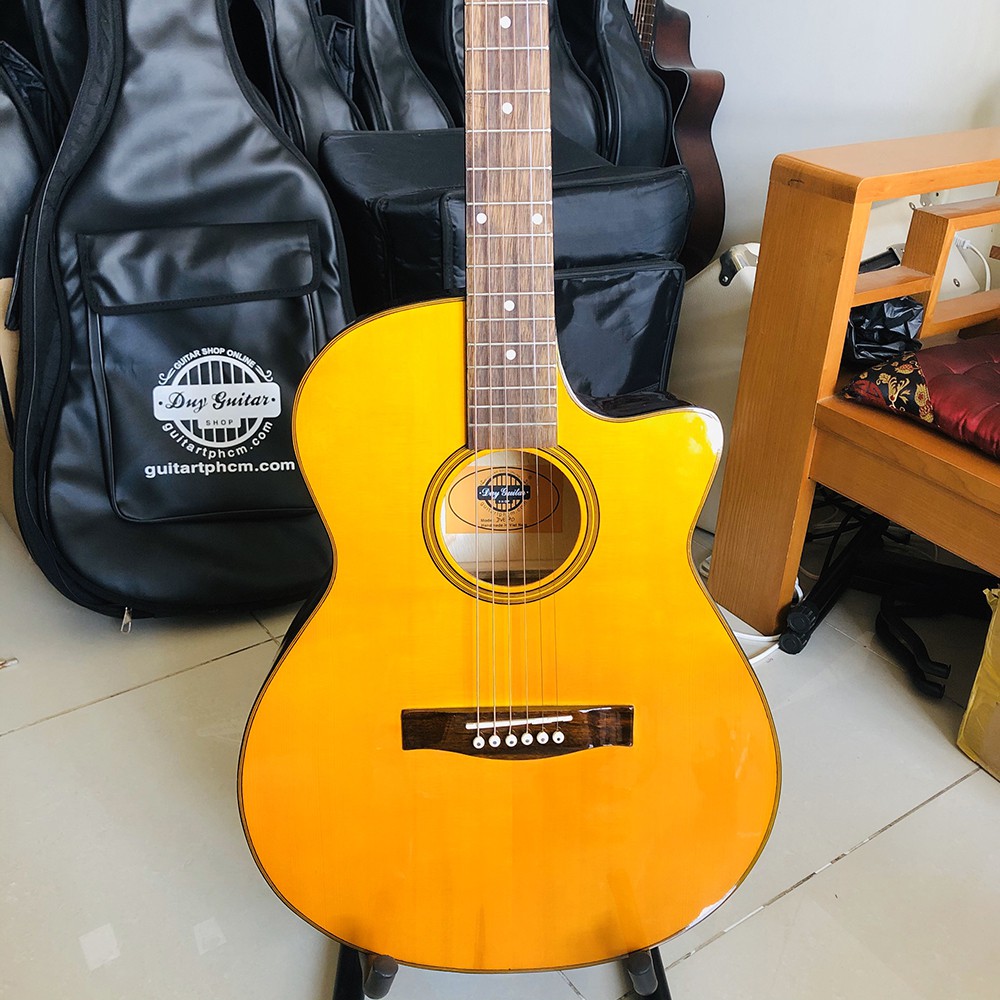 Đàn guitar acoustic DVE70 màu vàng tặng kèm phụ kiện