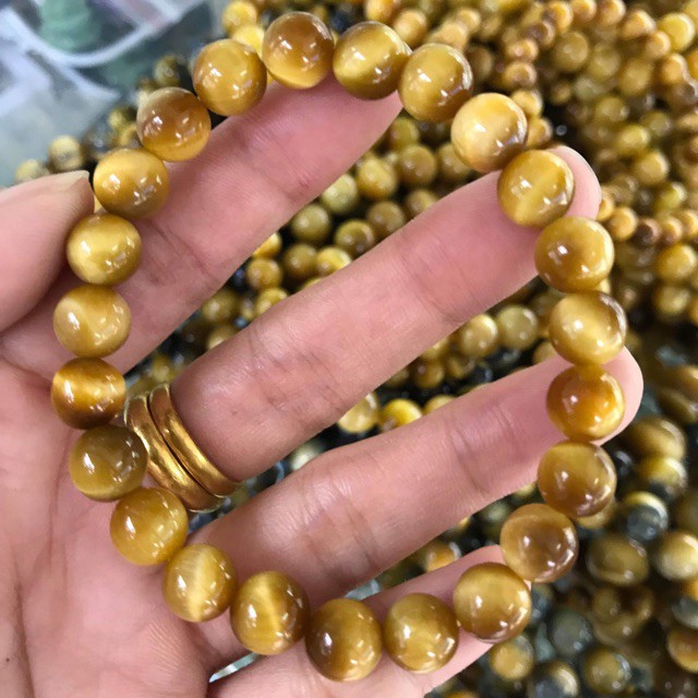  Vòng tay đá tâm vàng 8li vip 