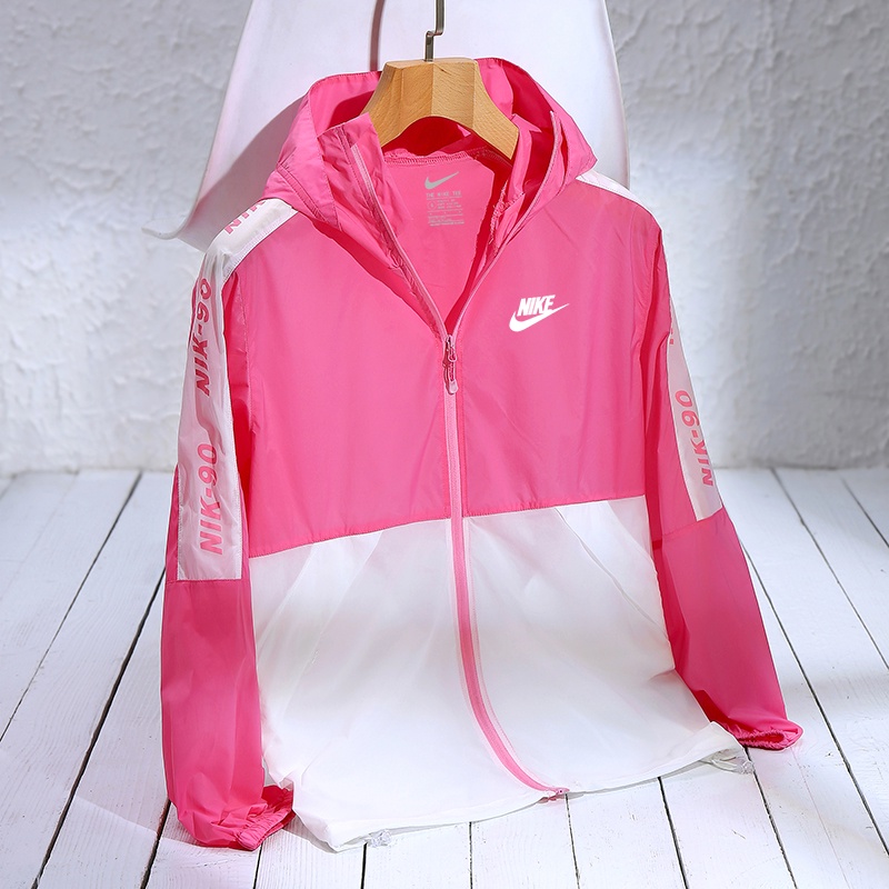 Áo khoác thể thao Nike mỏng có nón trùm bằng vải khô nhanh cho nữ