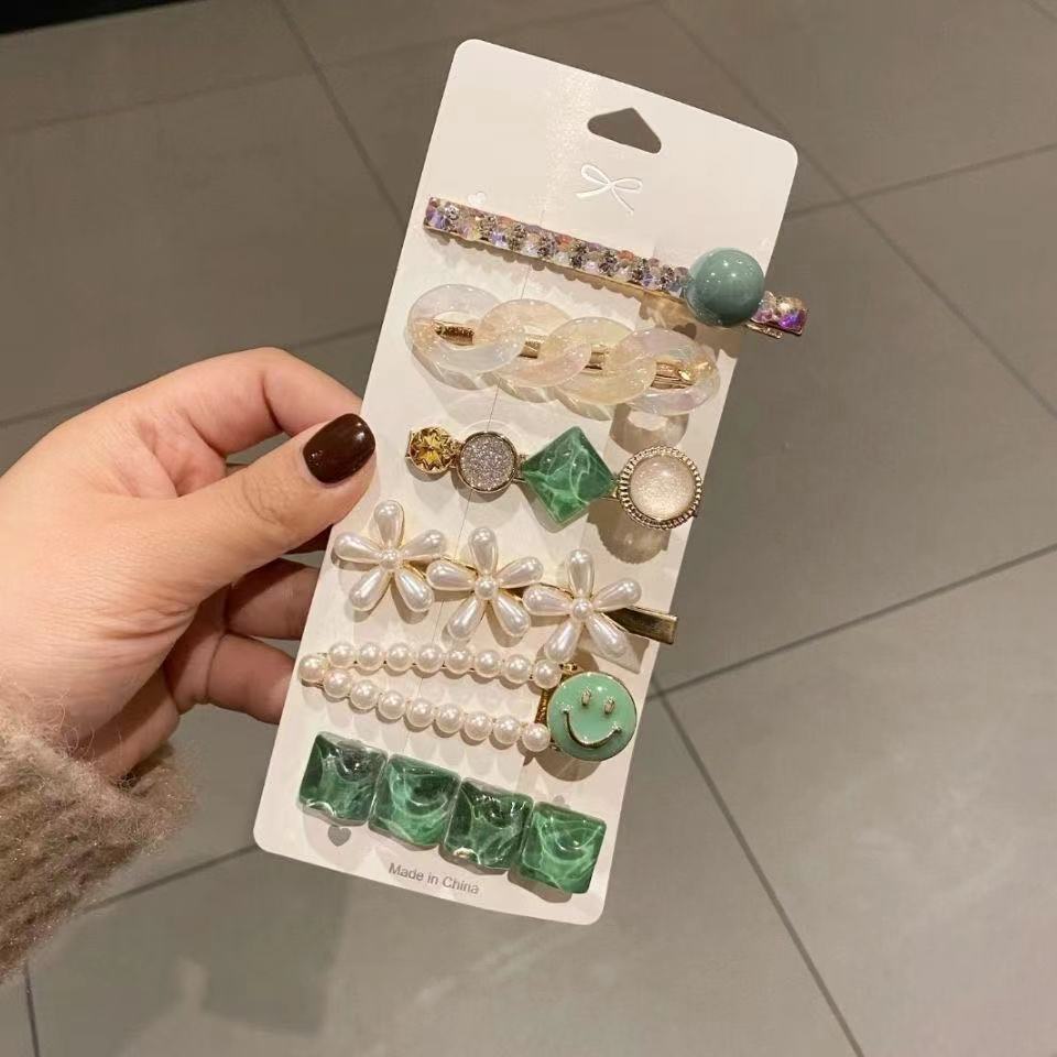 2021 bộ hoa ngọc trai kẹp bên cô gái sao biển ngọt ngào