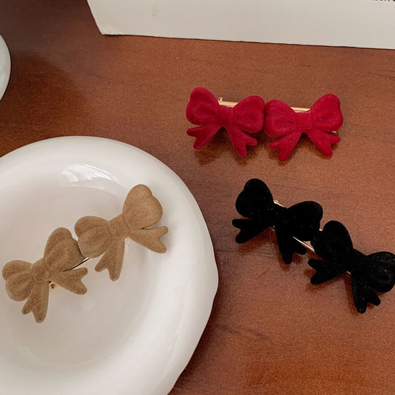 Kẹp tóc hình nơ xinh xắn cho nữ