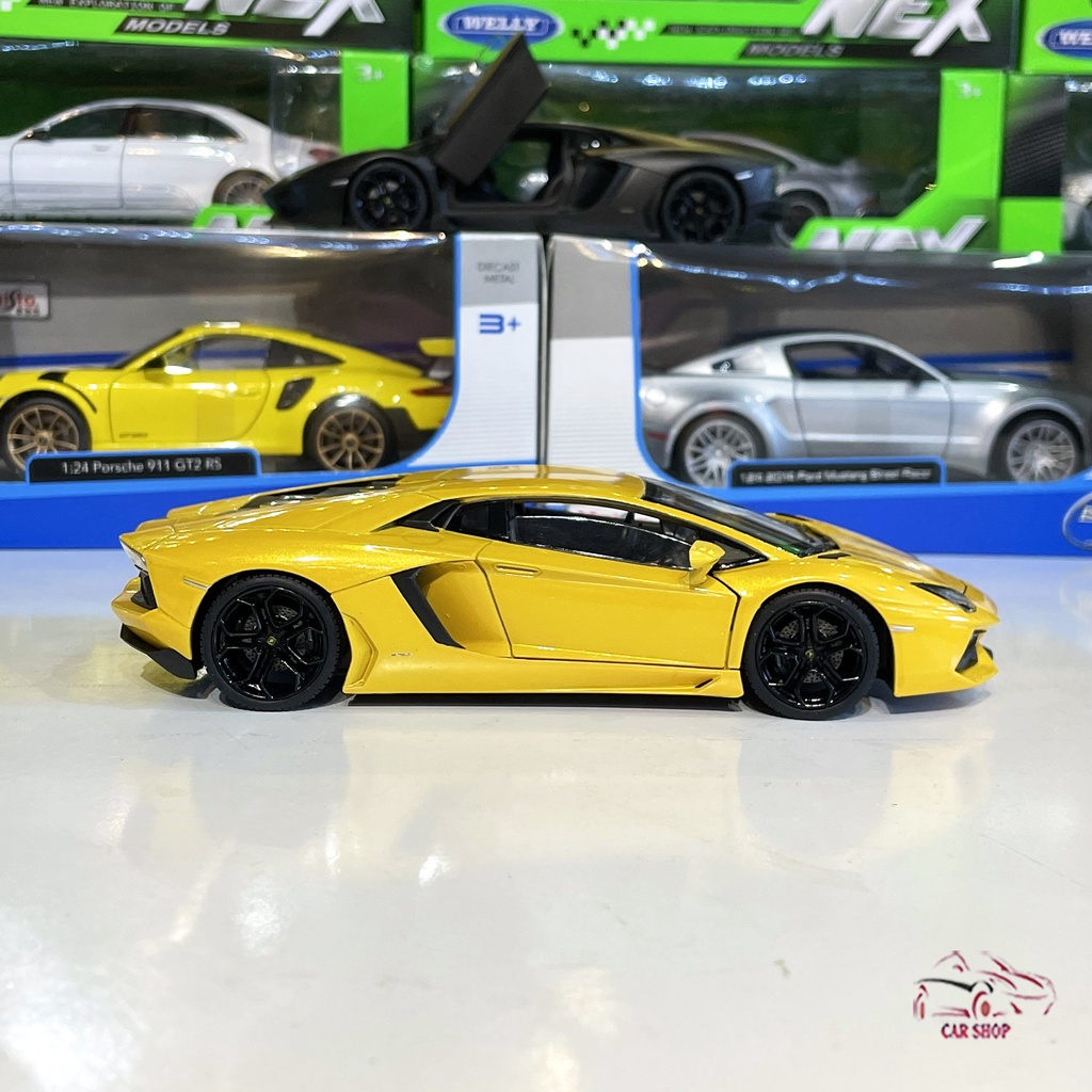 Mô hình xe bằng sắt Lamborghini-Aventador LP700 tỉ lệ 1:24 Welly màu vàng