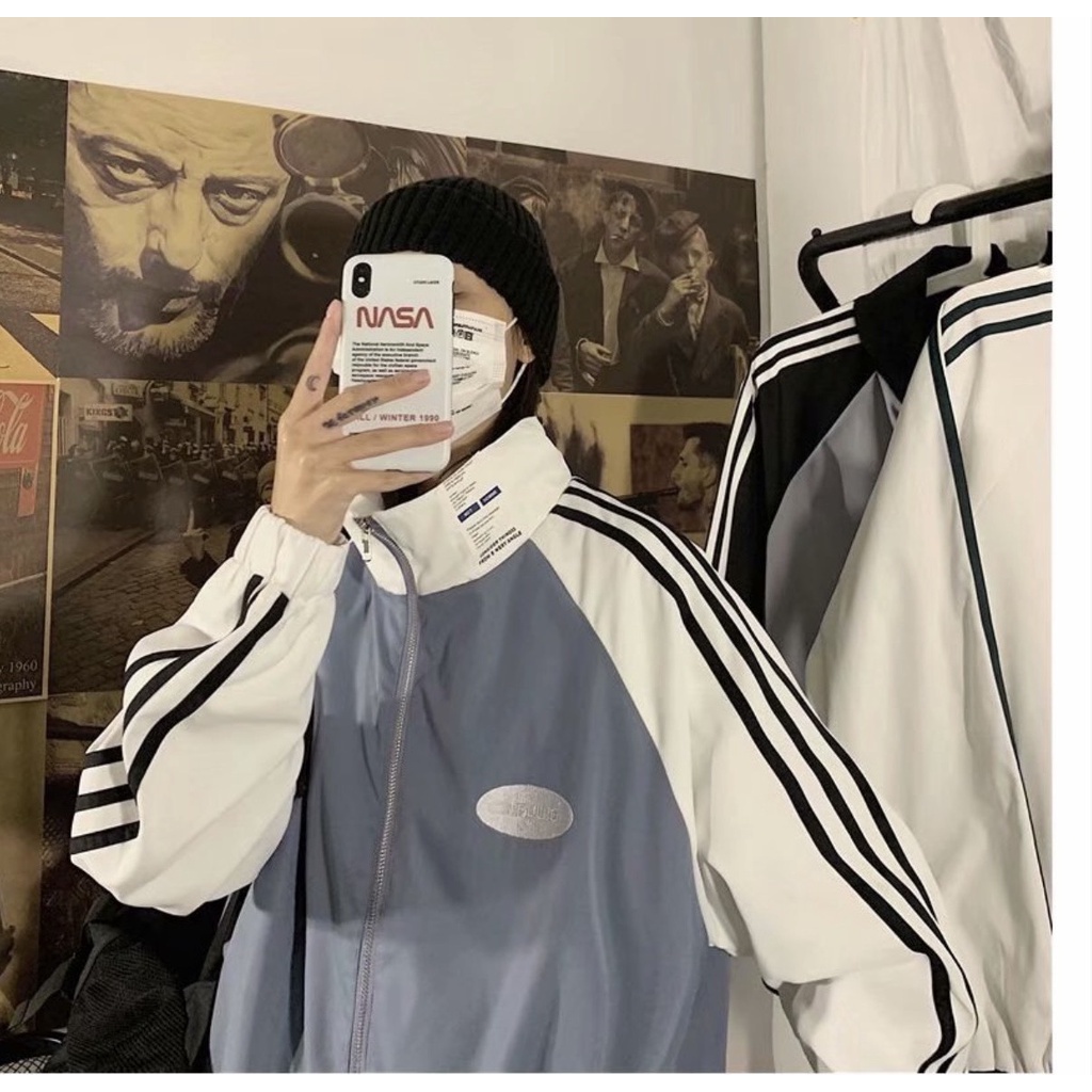 Áo khoác gió form rộng cổ cao, áo vải dù jacket 2 lớp unisex nam nữ họa tiết UnF chất đẹp giá xưởng Moonunisex