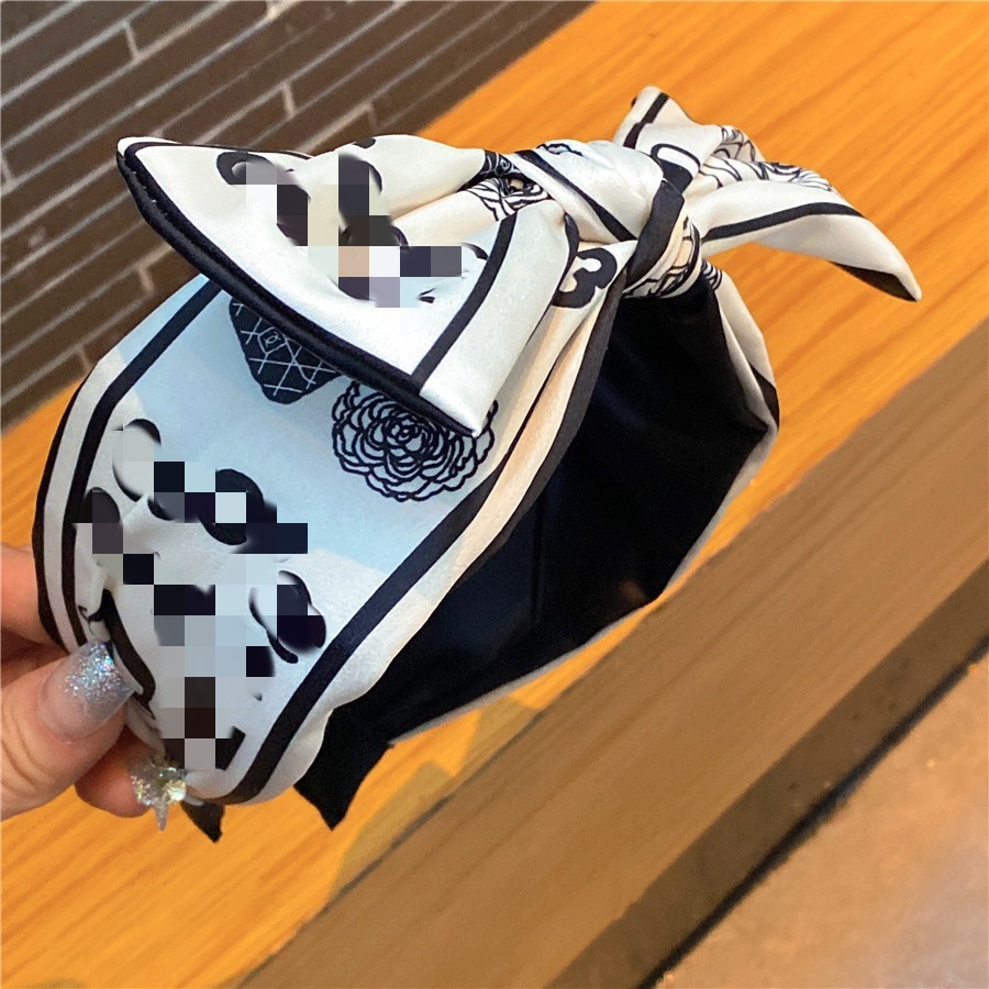 Bờm tóc thương hiệu CC hoa trà sang chảnh bản to TB576