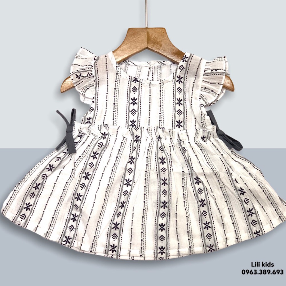 váy bé gái cánh tiên baby, cotton mầu trắng họa tiêt, nơ điệu đà cho mùa hè