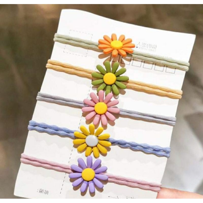Thun cột tóc hoa cúc