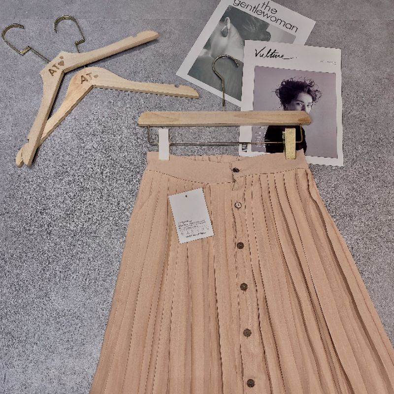 CHÂN VÁY MIDI BE KHUY GỖ