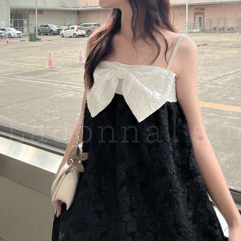Đầm 2 dây baby doll vải gấm phối nơ
