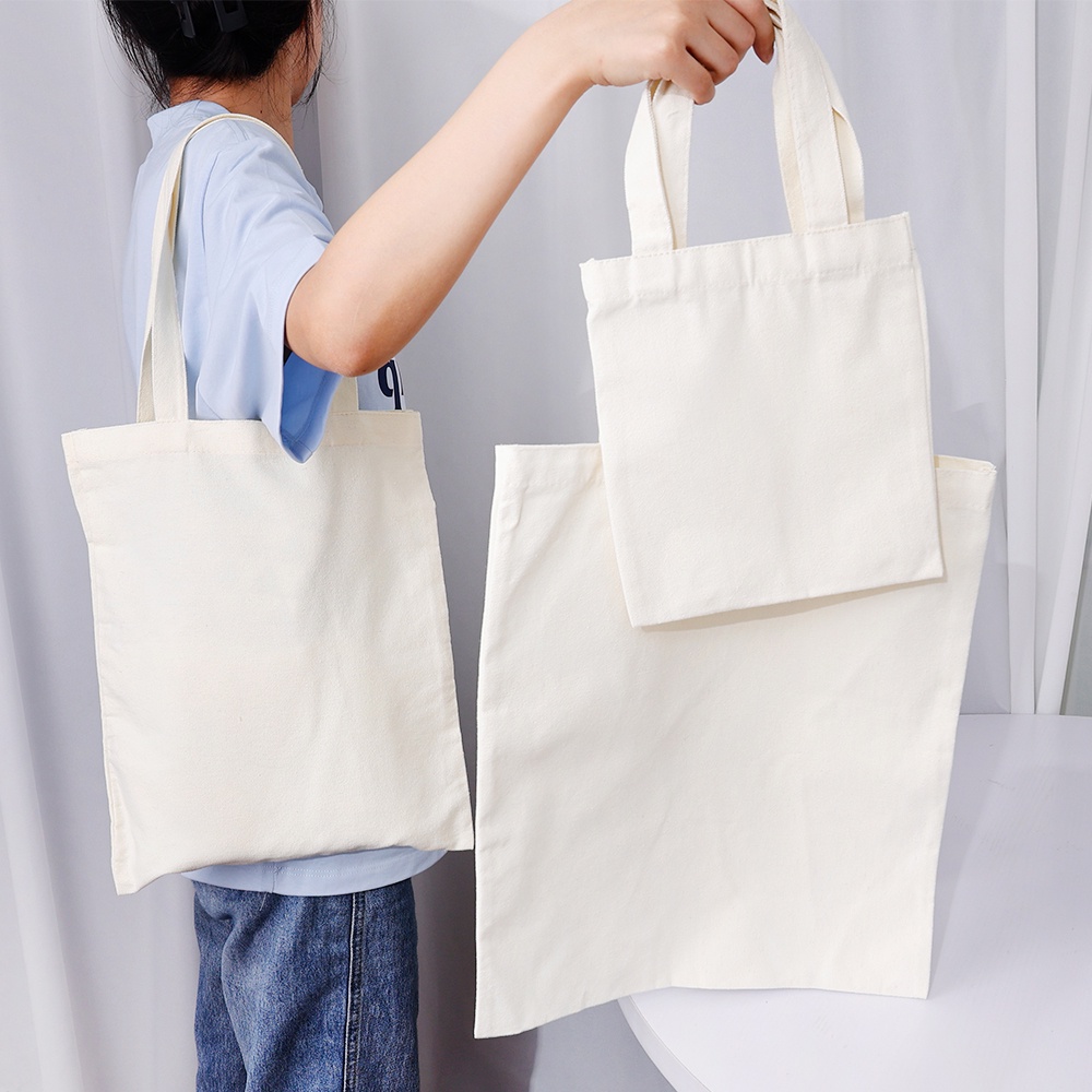 Túi Xách Vải Canvas Màu Trắng Kem Dung Tích Lớn Tái Sử Dụng Linh Hoạt Cho Nữ