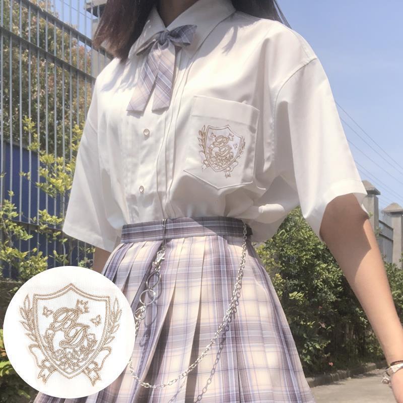 Áo sơ mi nữ tay ngắn màu trắng thêu hình phong cách mới