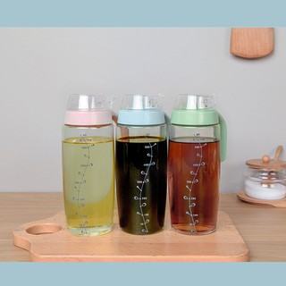HCM - Bình thủy tinh đựng dầu ăn hàng đẹp dày có vạch chia dung tích