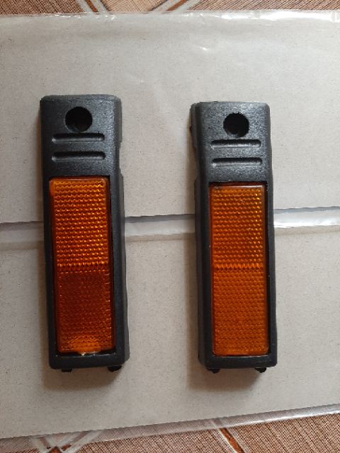 Cặp mắt mèo phản quang xe Dream lùn loại dài