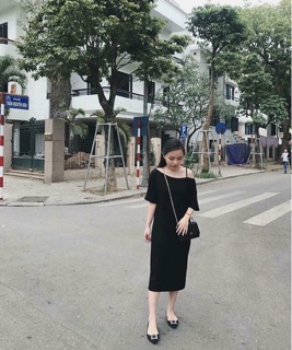 Váy xuông lệch vai