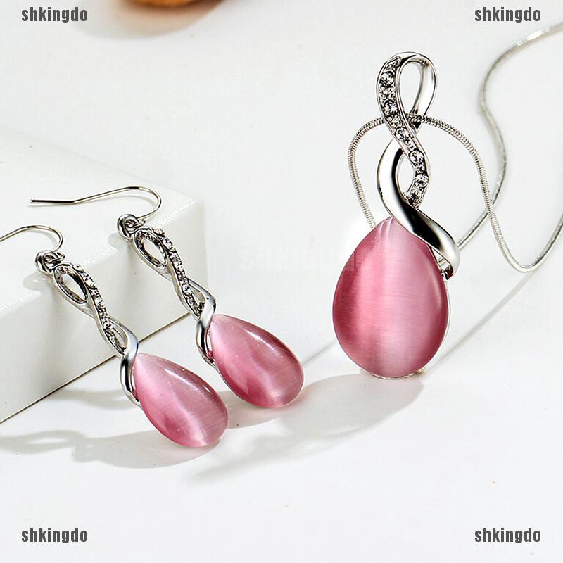 Bộ dây chuyền và bông tai đính ngọc mắt mèo