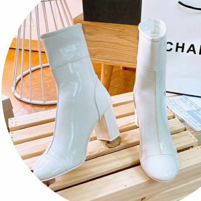 Boots cao cổ Chanelll trắng đen cực hot hit (hãy chat với shop nhé)